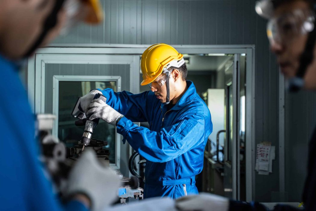 asian-mechanical-workers-working-on-milling-machin-2021-12-09-21-04-01-utc